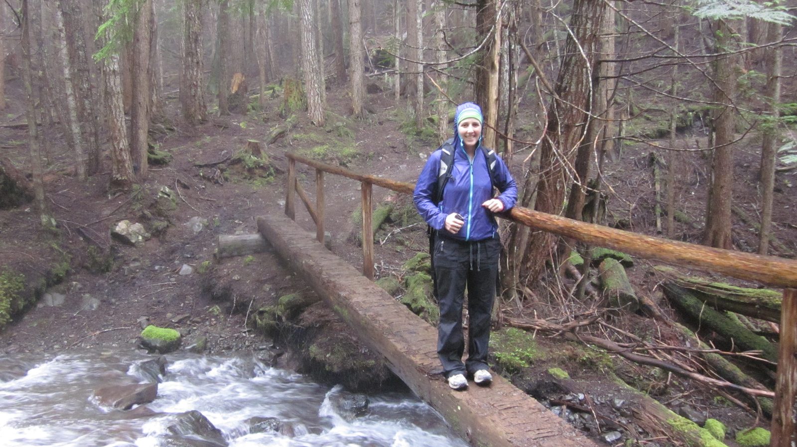 Standing on a log bridge!