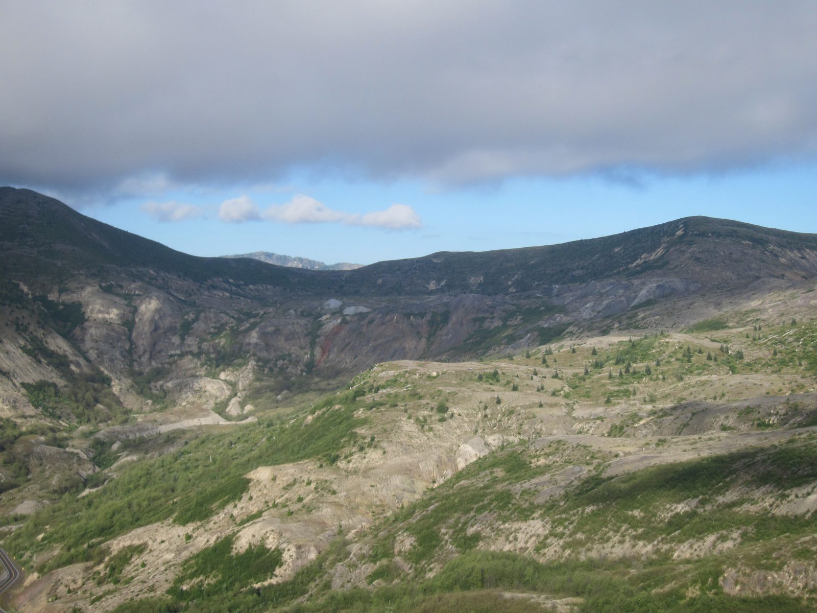 If you zoom in on the middle of this photo, there is a gully that appears to be painted red.  I...