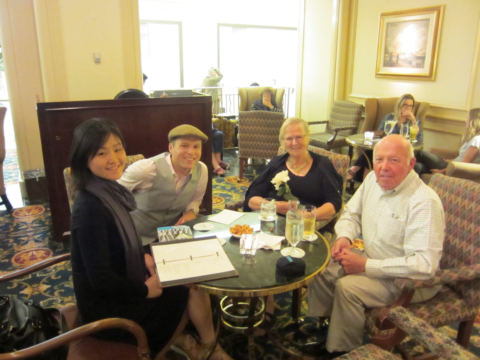 Monica, John, Mom, and Dad have a drink at the Fairmont Vancouver before Mom's big birthday...