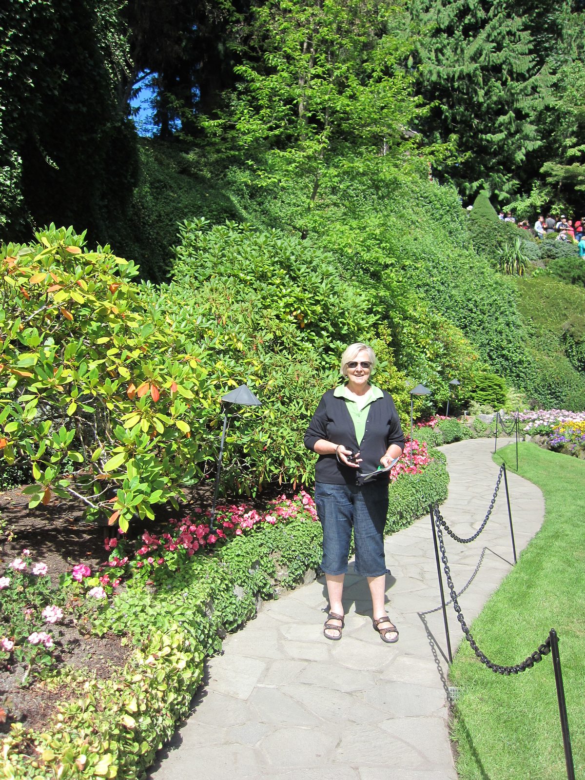 Mom wanders the paths.