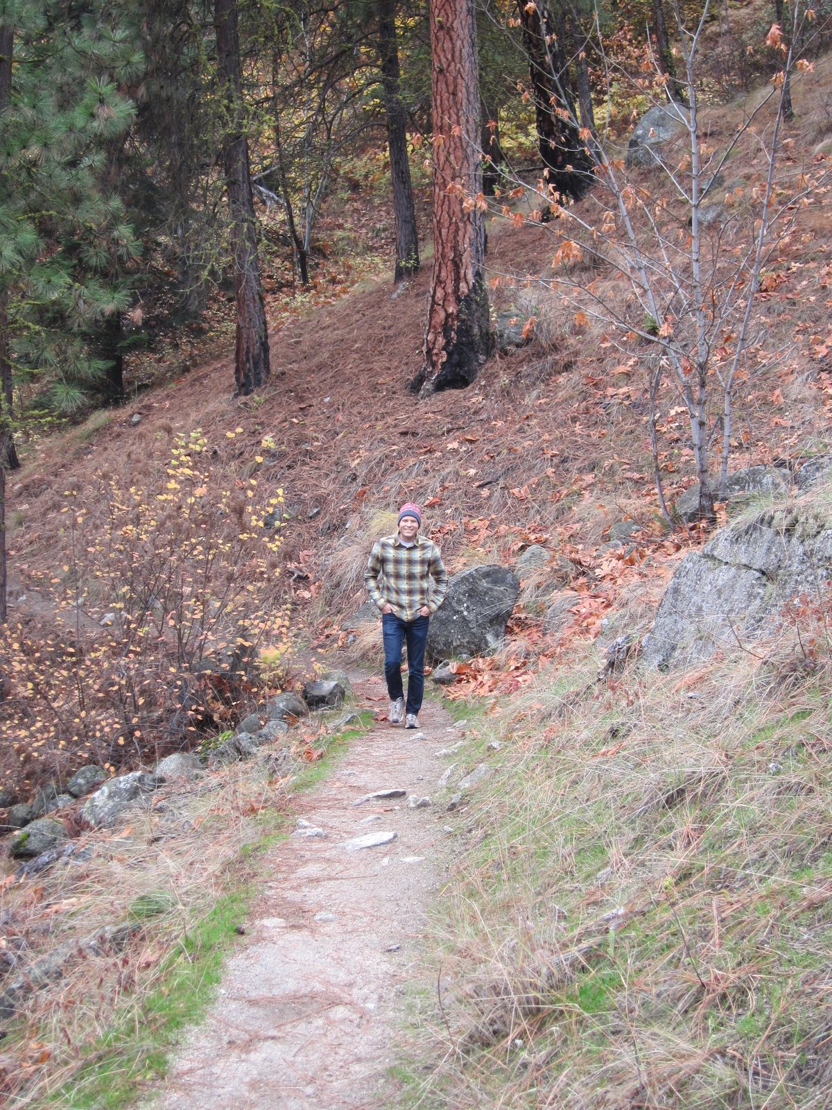 John marches up the trail.