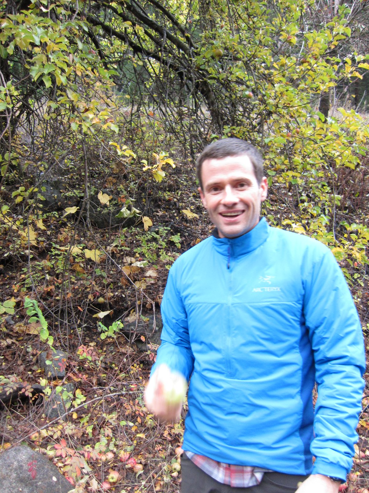 Jay looking excited: not only did he successfully bat an apple out of the apple tree we found...