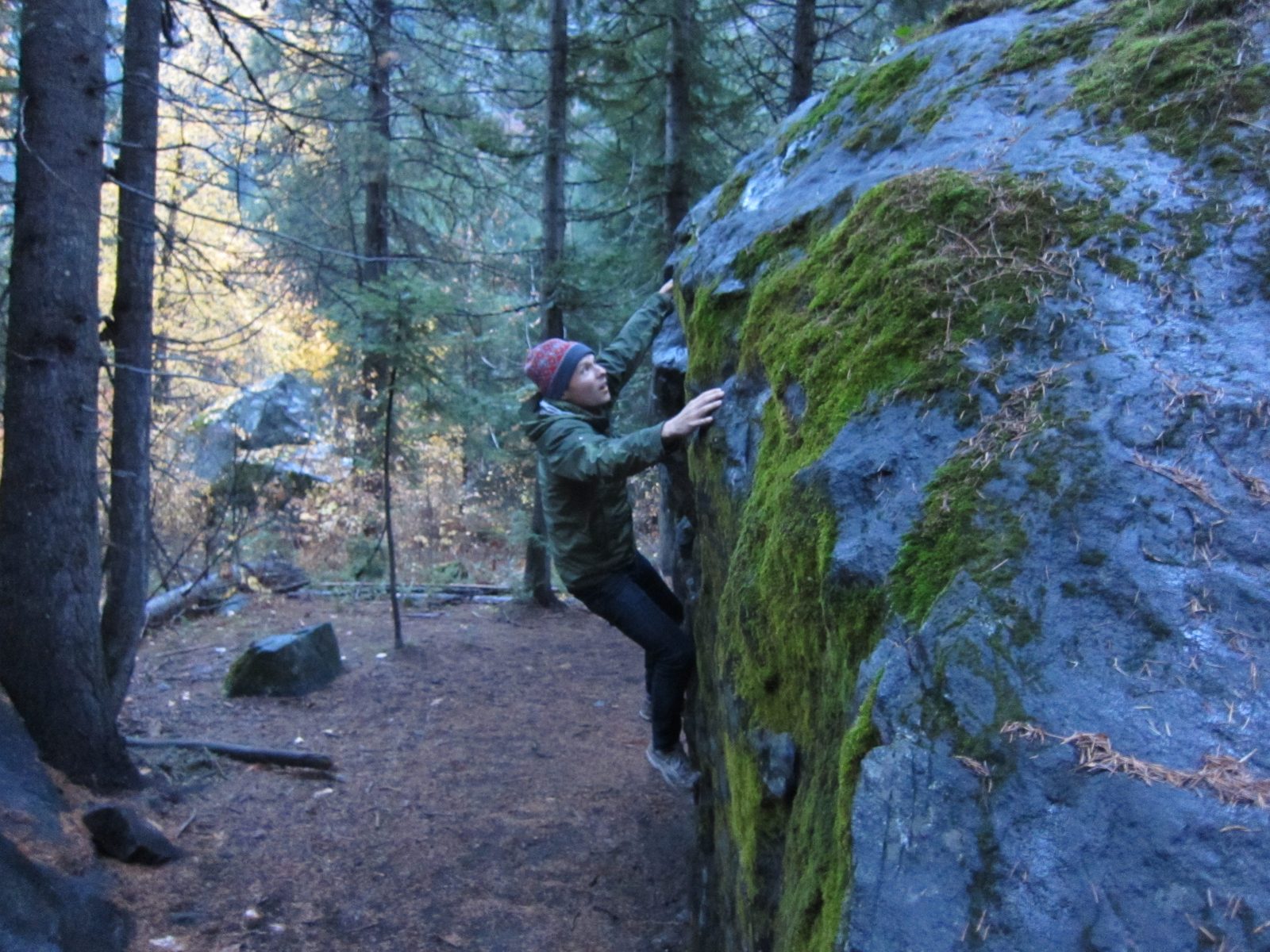 John tackles another problem.  They both claimed the moss, wet rock, and lack of real climbing...