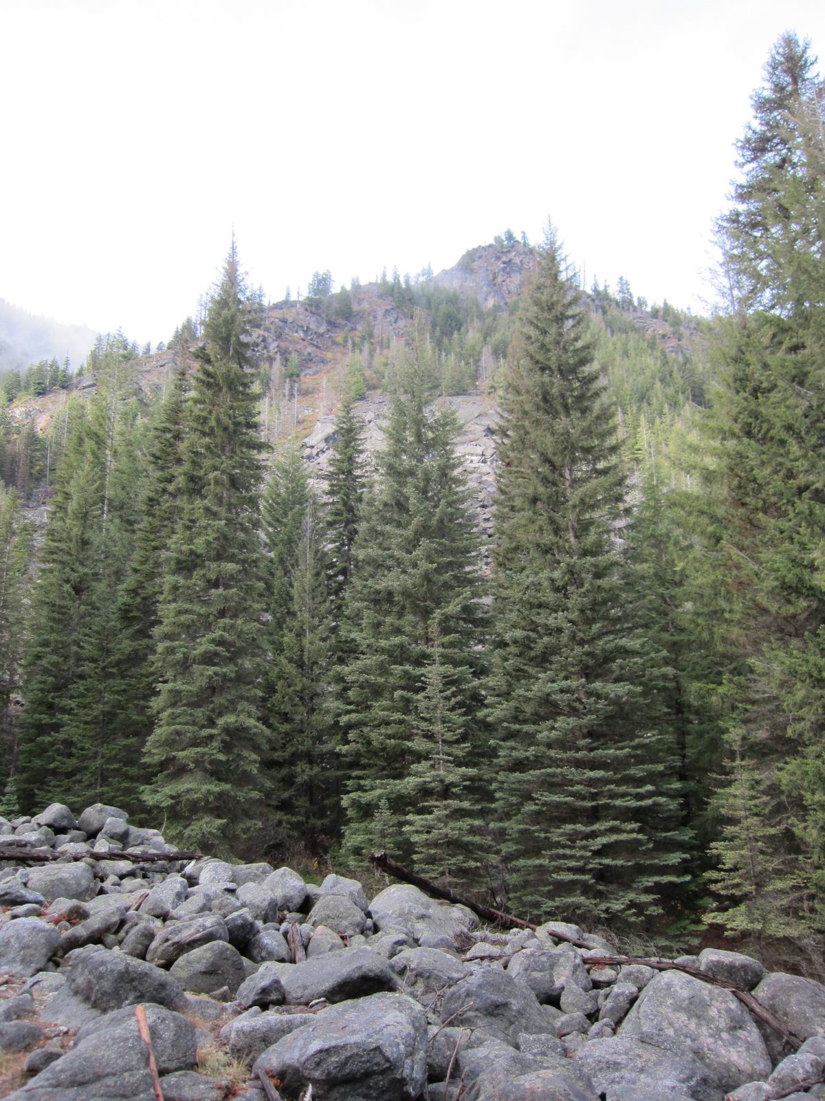 The surrounding mountains began to come into view.  It should be noted that we started our hike...