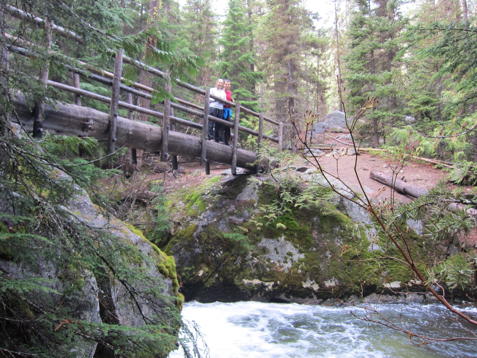 Catherine and Jay, on a bridge.