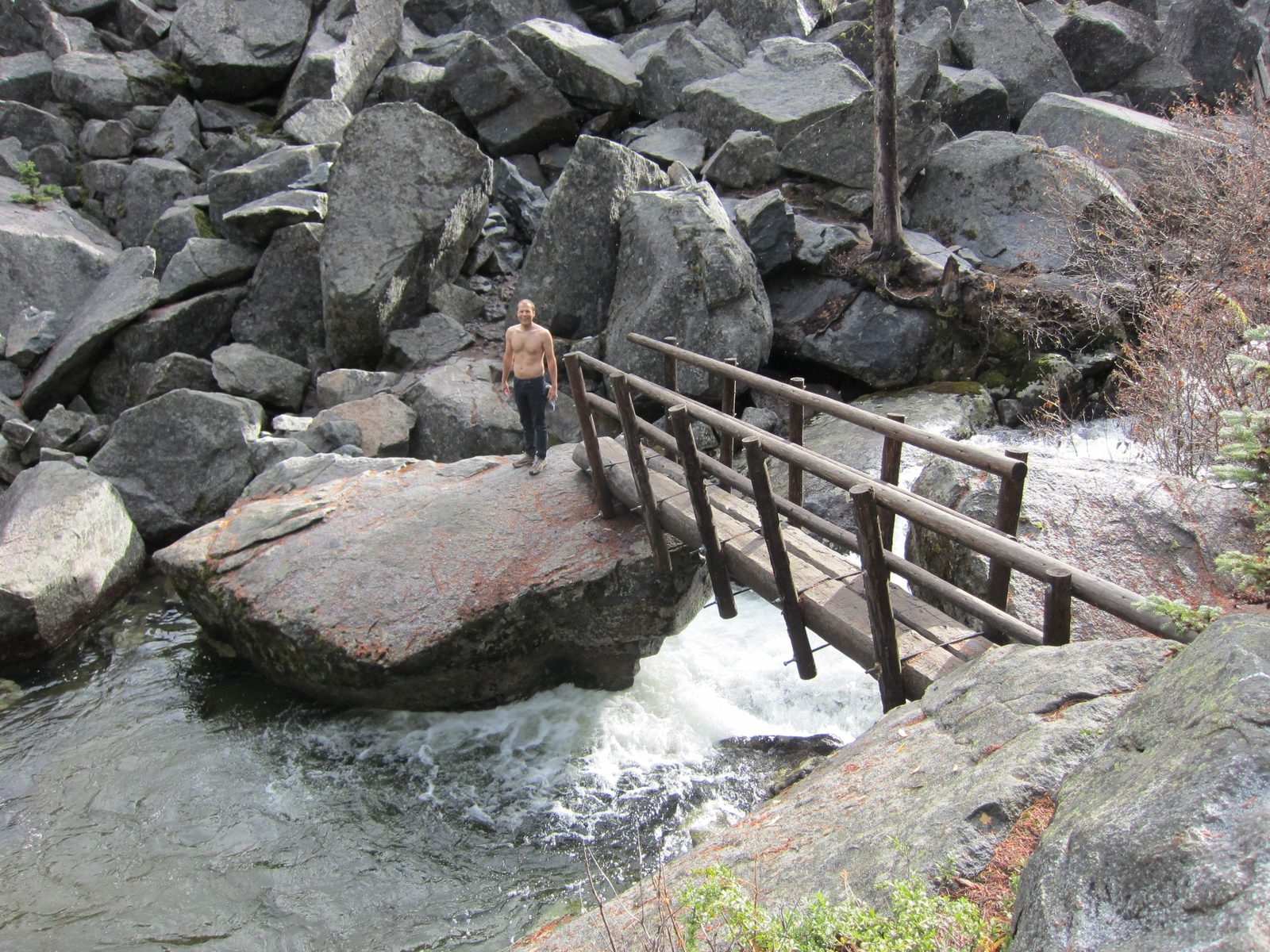 John poses on the far side of the creek.