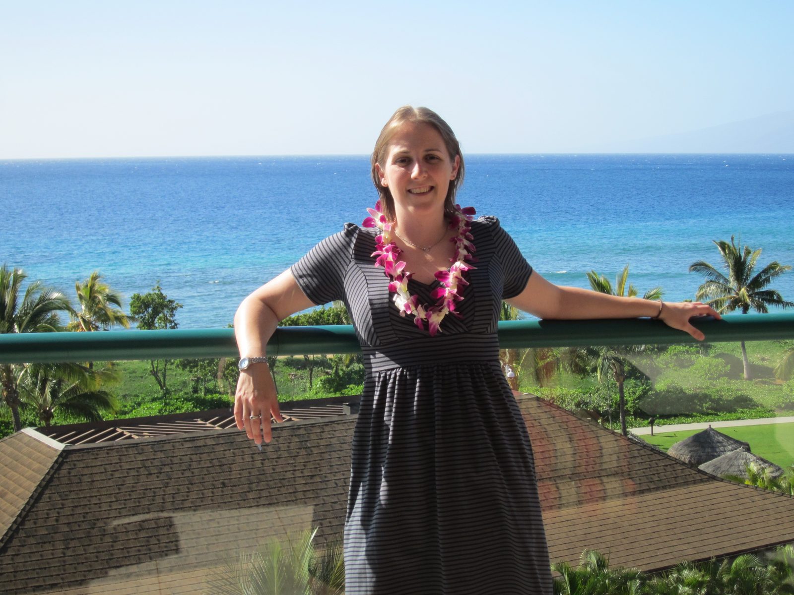 Before dinner Saturday night.  My dress was too drab, I decided, so I wore the lei Lucie had...