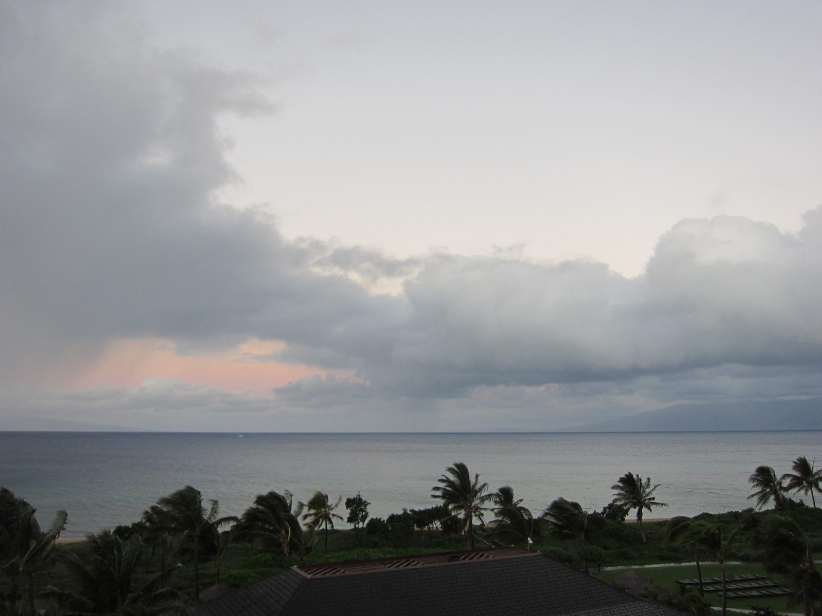 More stormy weather towards Moloka'i.  Note the whale splash in the water.