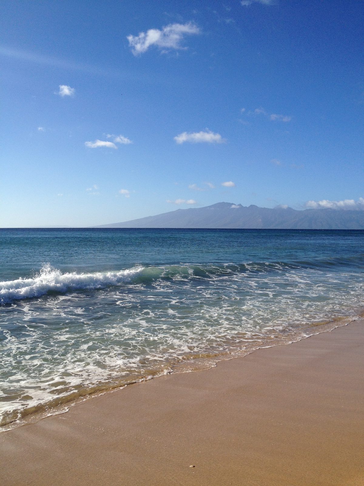 Looking towards Moloka'i from the beach in front of Bob and Lucie's condo on Maui.