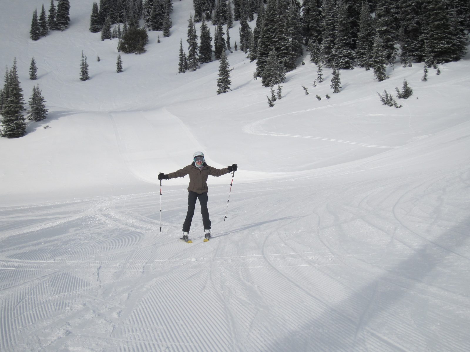Chrissy skiing down some trail on the skier's right side of the mountain.