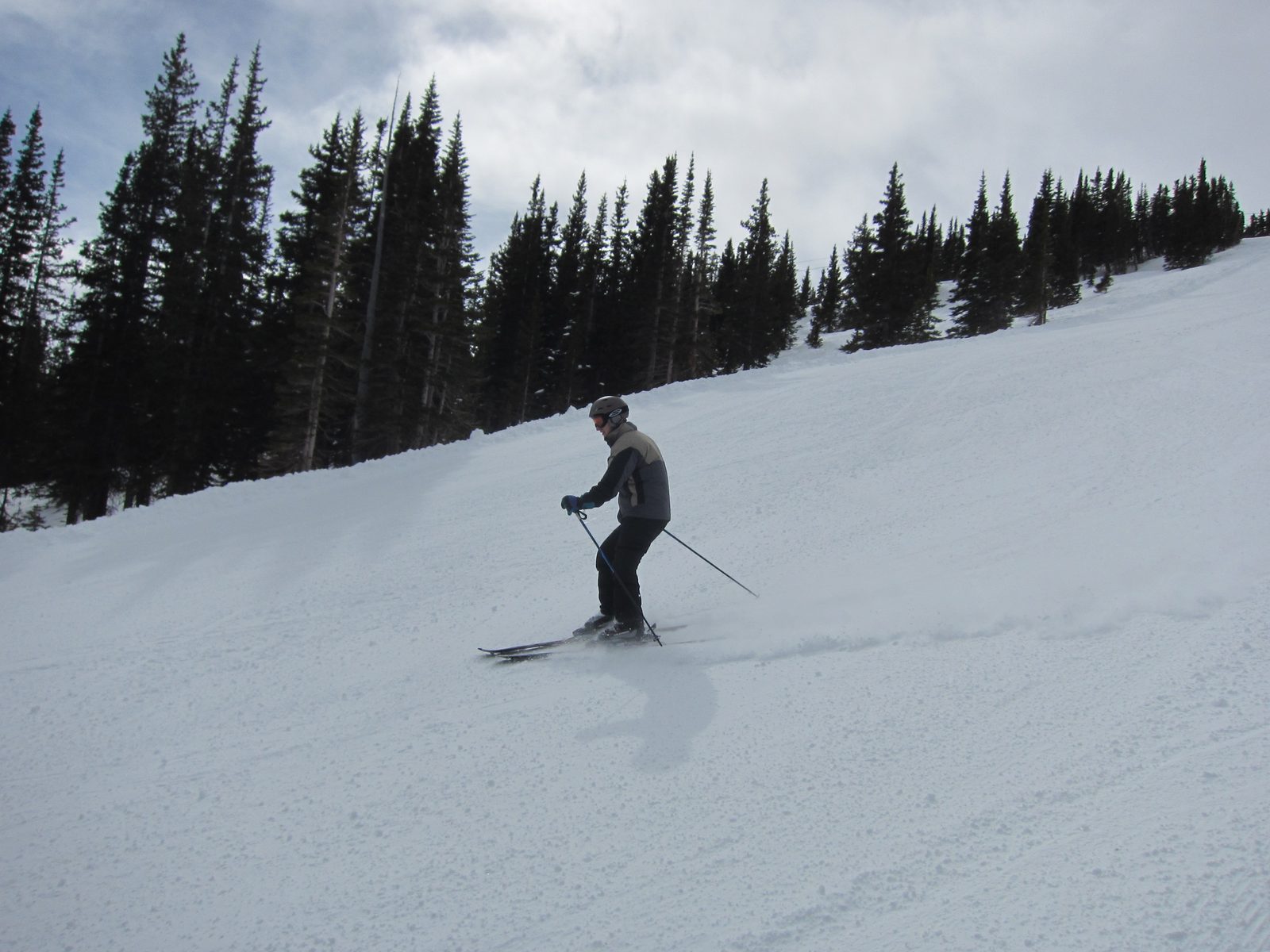 Daniel cruising down a wide open and empty black off the top of the T-Bar.