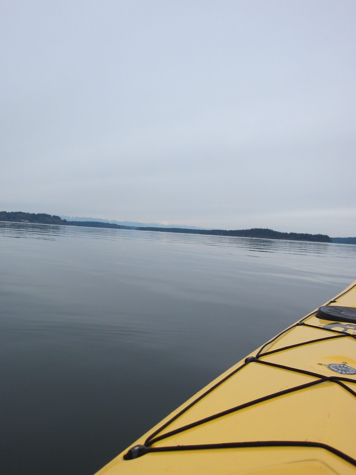 Trying to capture the Olympics peeking out under the clouds.