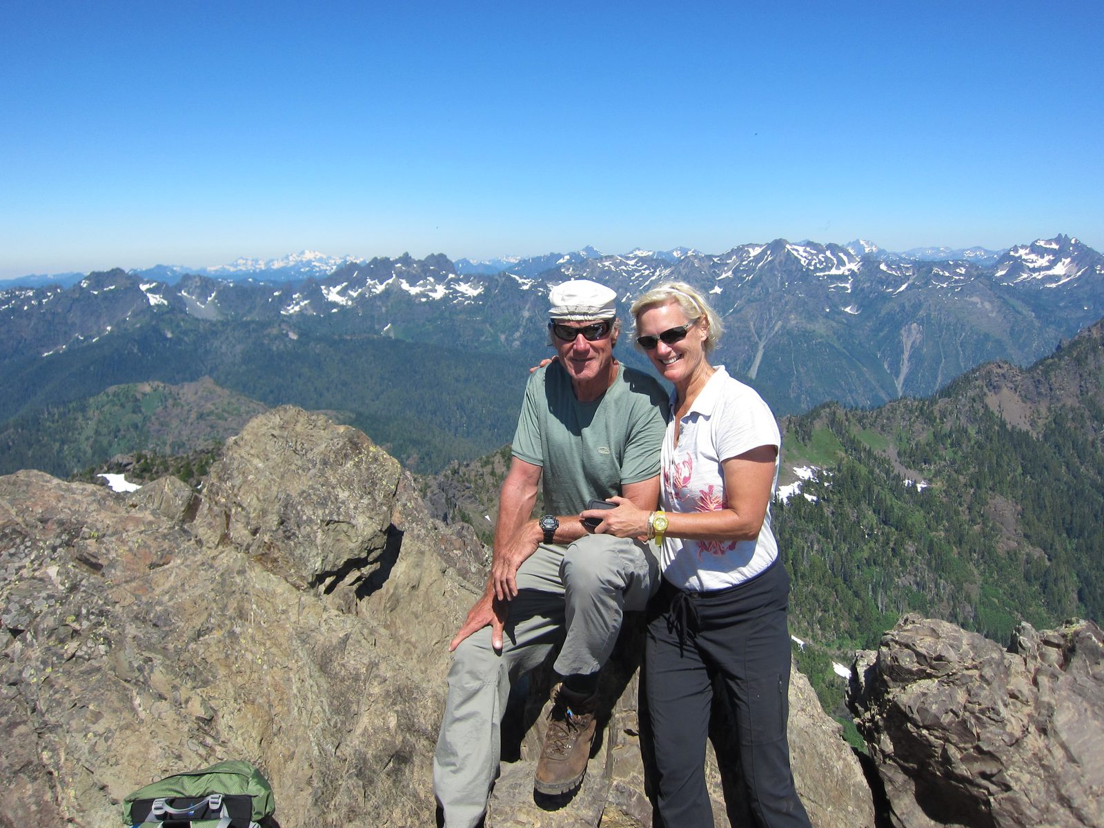 Frank, Kathie, and some mountains.  The snow-capped one in the back left is Mt Olympus,...