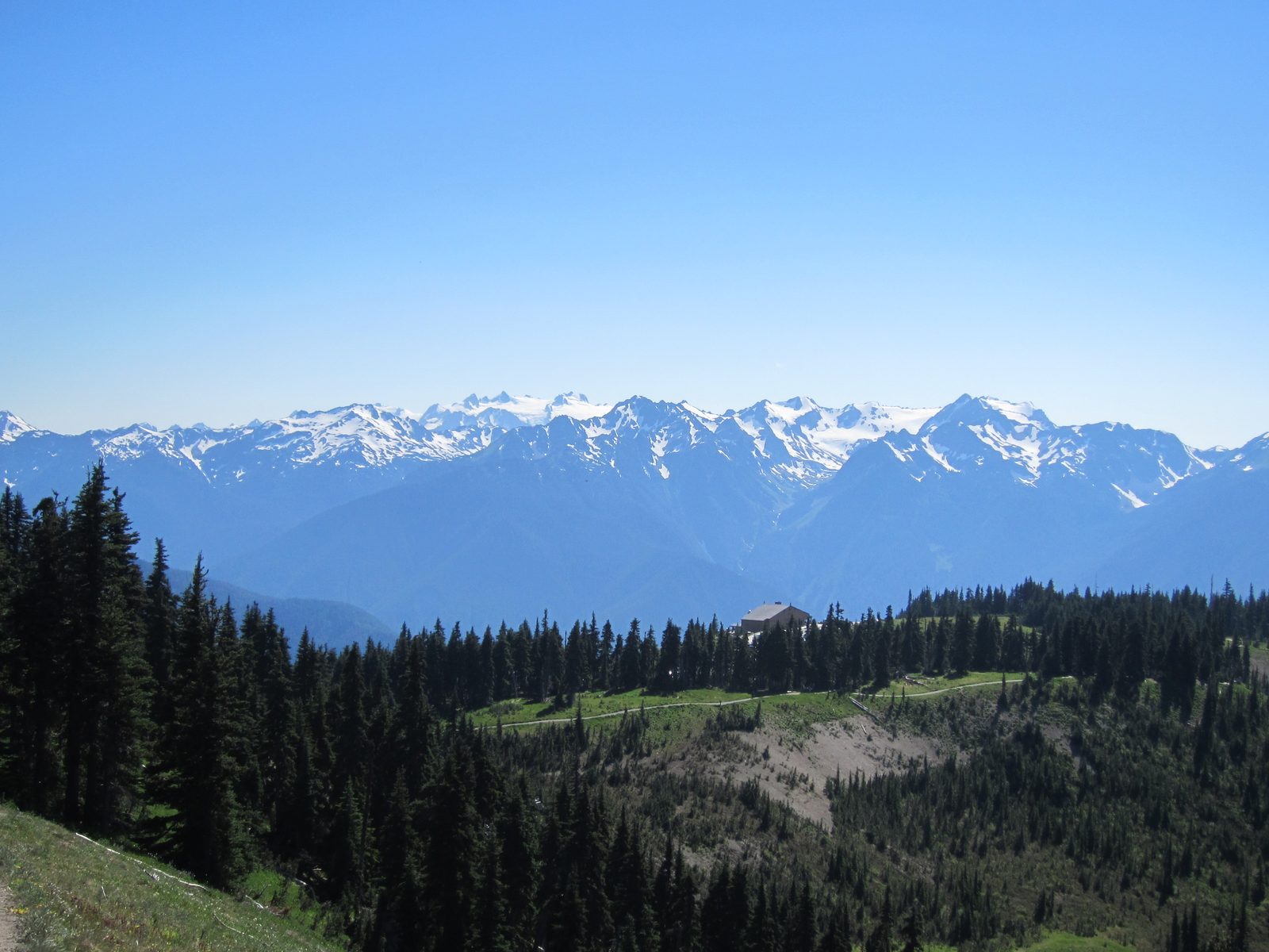 Looking down at the Visitor Center and across at the mountains from the High Ridge Trail.