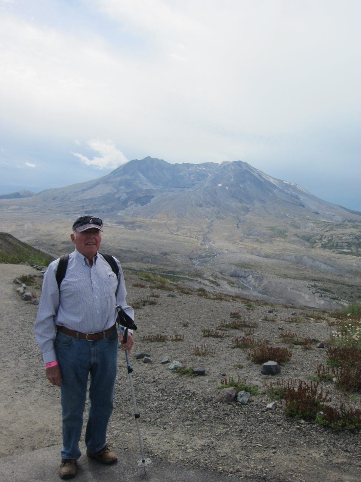 Dad with the remains of MSH in the background - 1300 ft less mountain than was there in early 1980.
