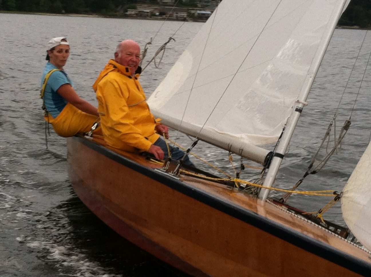 Coming closer to the committee boat.  At least Dad knows how to smile.