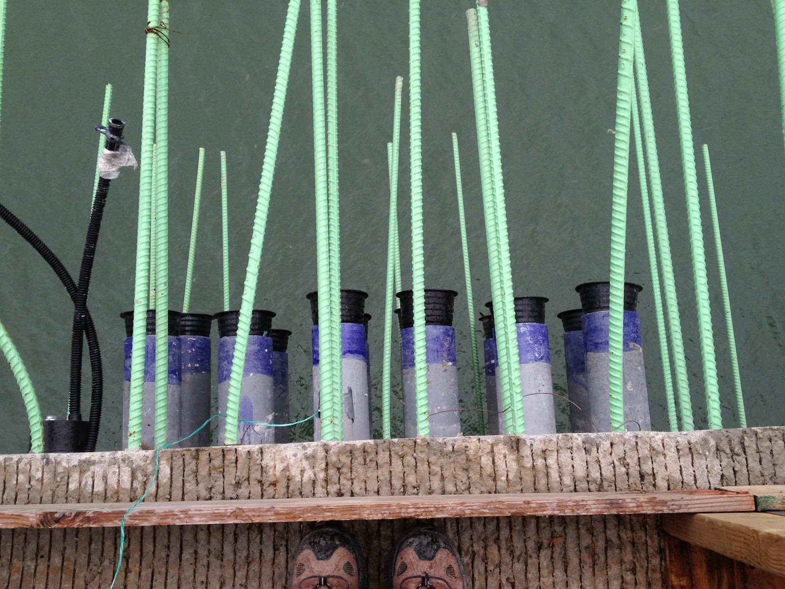Standing at the mainspan edge of the pier table, directly over the median ductbank.  Eventually...