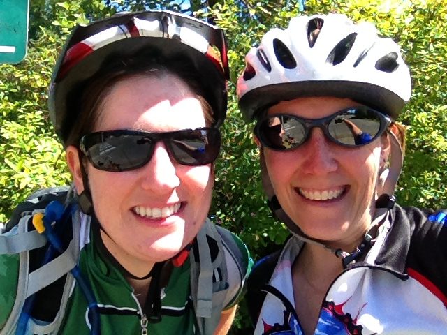 My friend Stephanie and I, after a nice bike ride.  Best part of this photo: reflection of my...