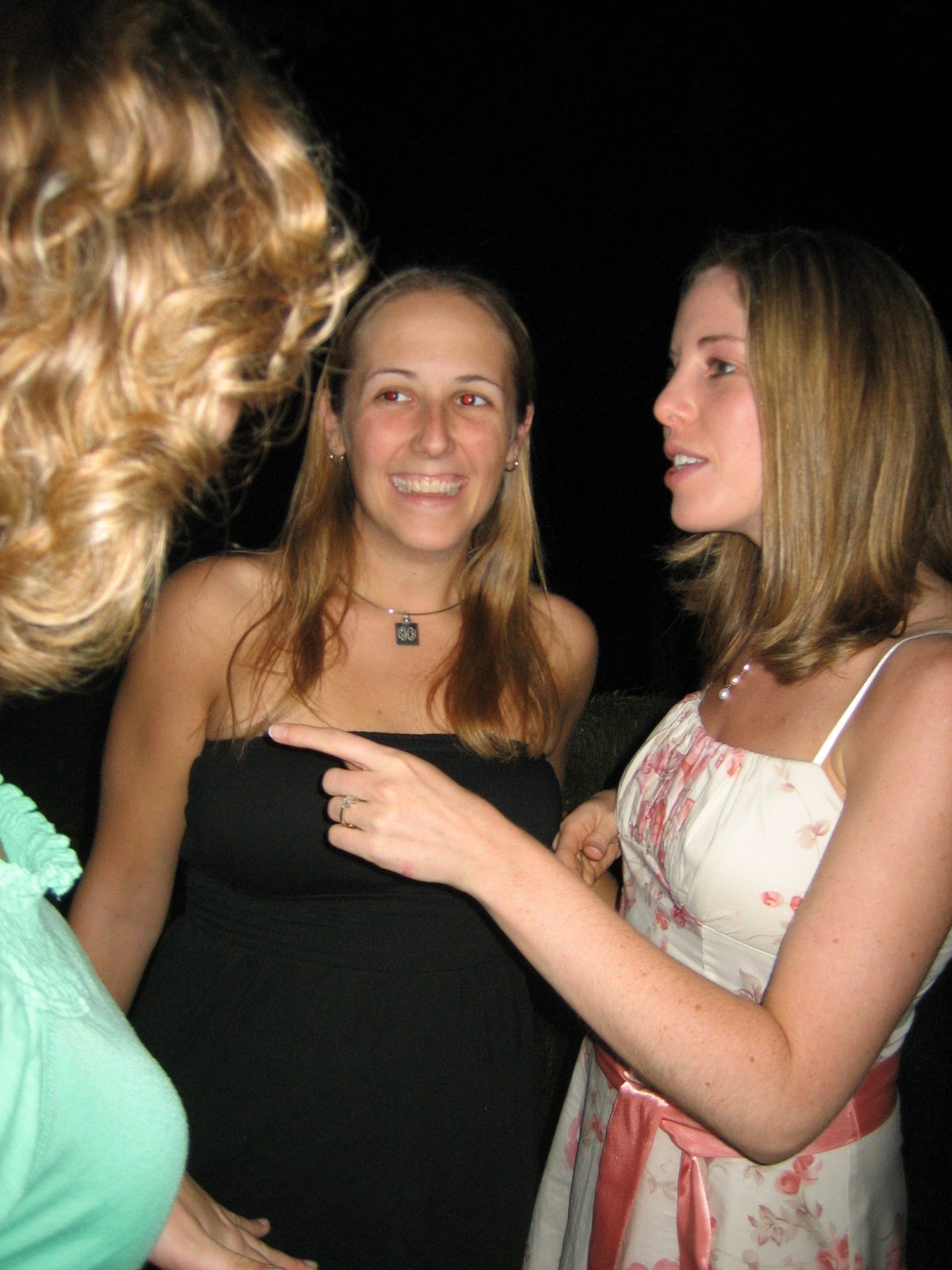 Amy, Catherine, and Amber, nearing the end of the rehearsal dinner.