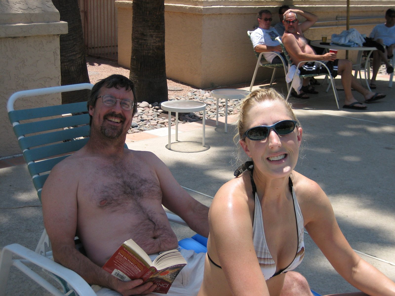 Brett and Karissa by the pool (what are they doing in the shade?).