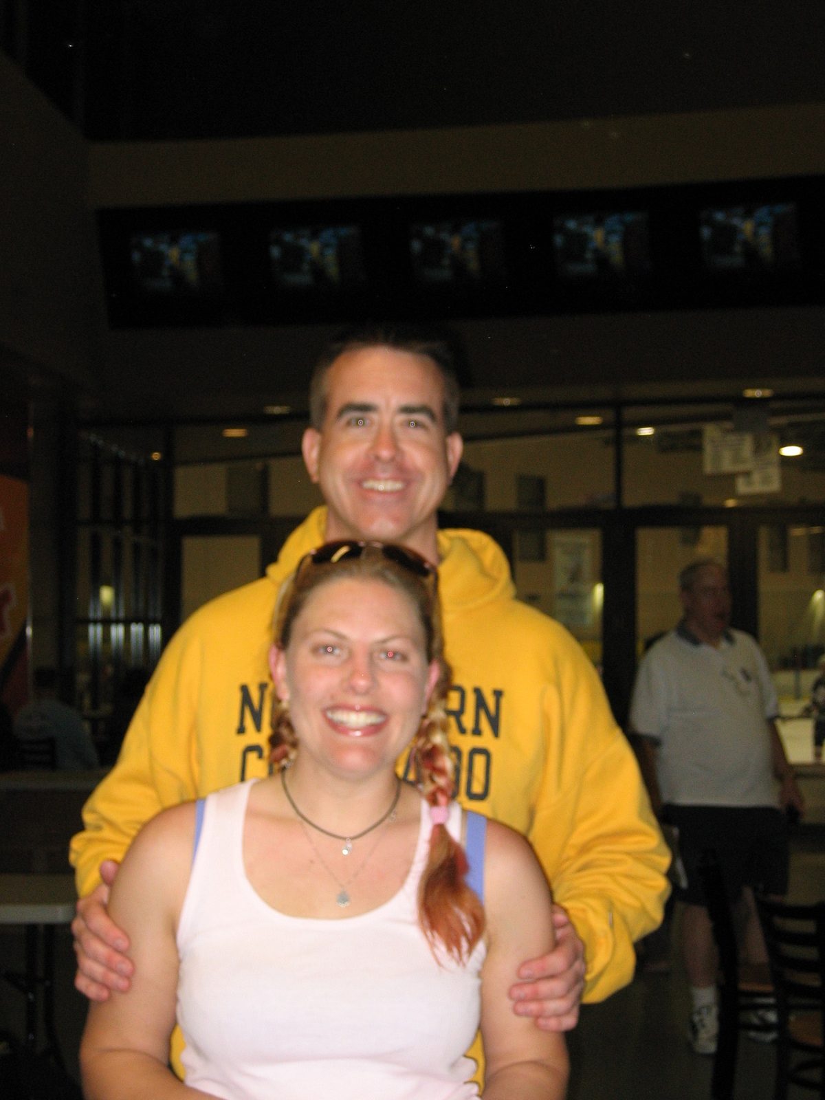 Grr - I'm mad this is blurry, cause it's cute.  Mike (coach #2) and Ginger, post-championship.