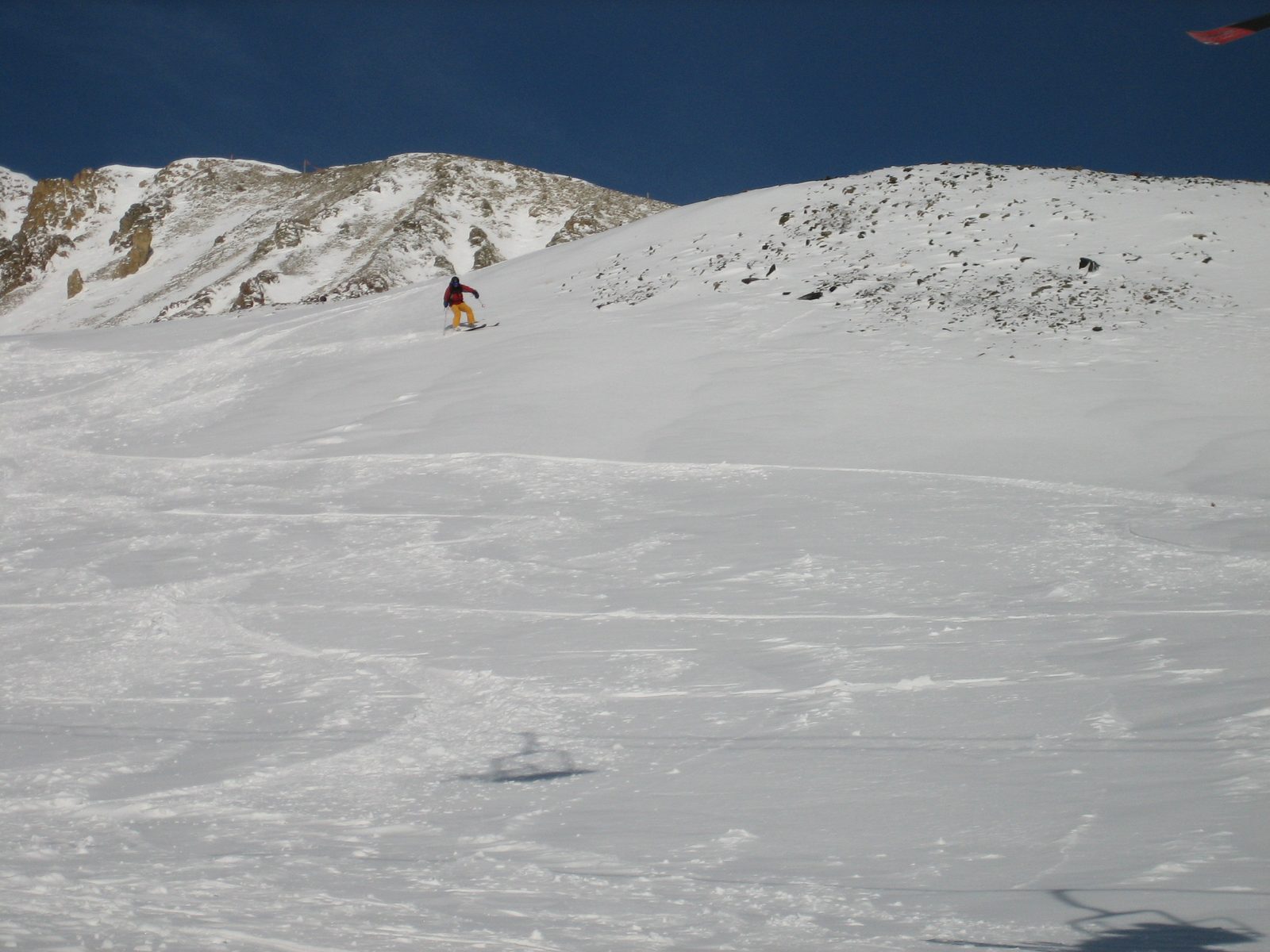 John cuts hard skier's left to get in the less-touched snow