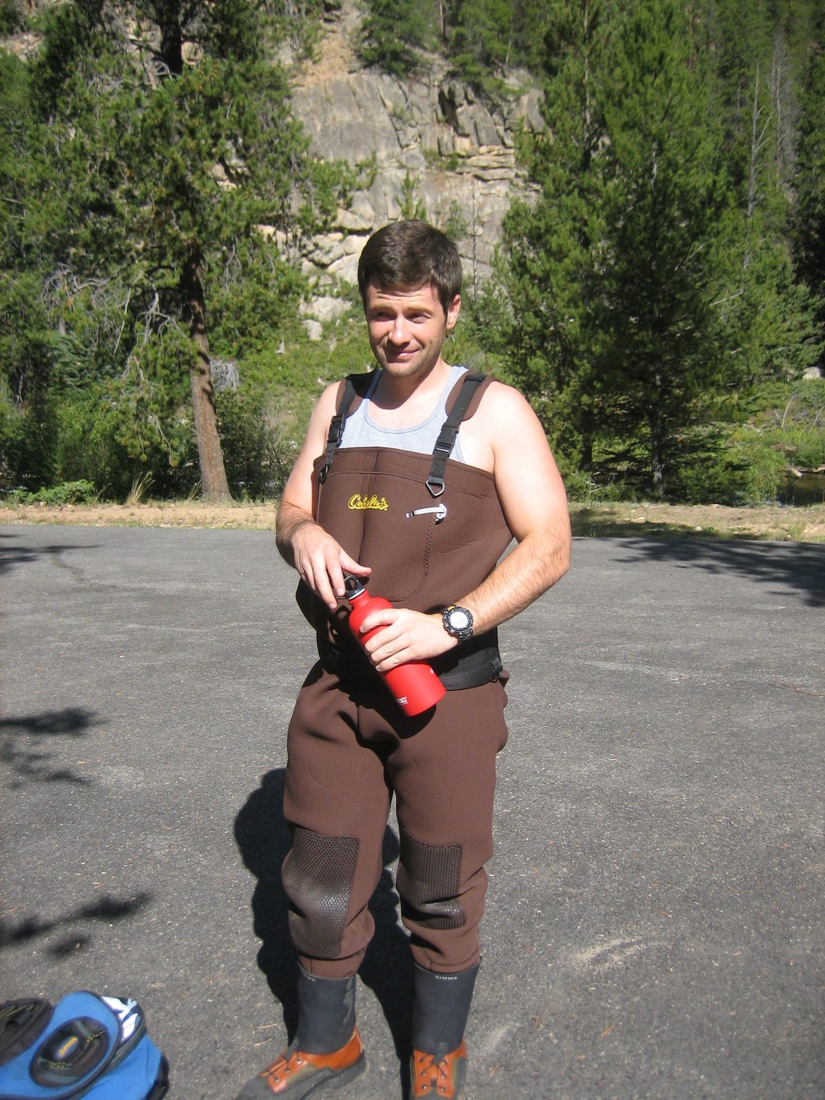 Jay, wearing Jerry's winter waders, ready to go into the river