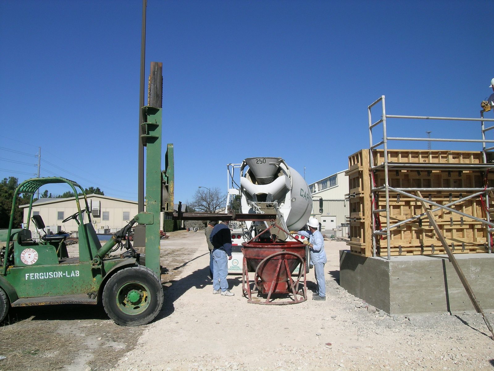 Loading the bucket from the truck.