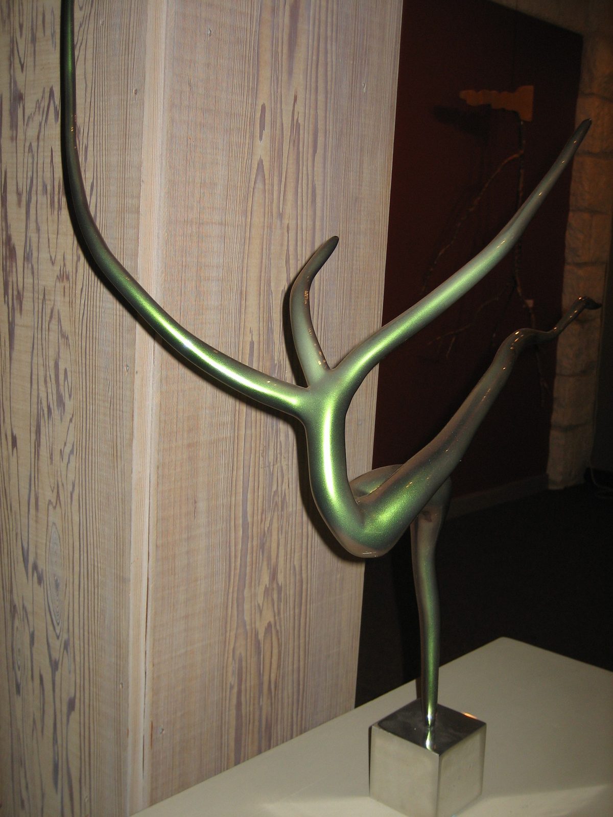 One of the nicer pieces indoors.  It's made of a stick that has been sanded and painted.
