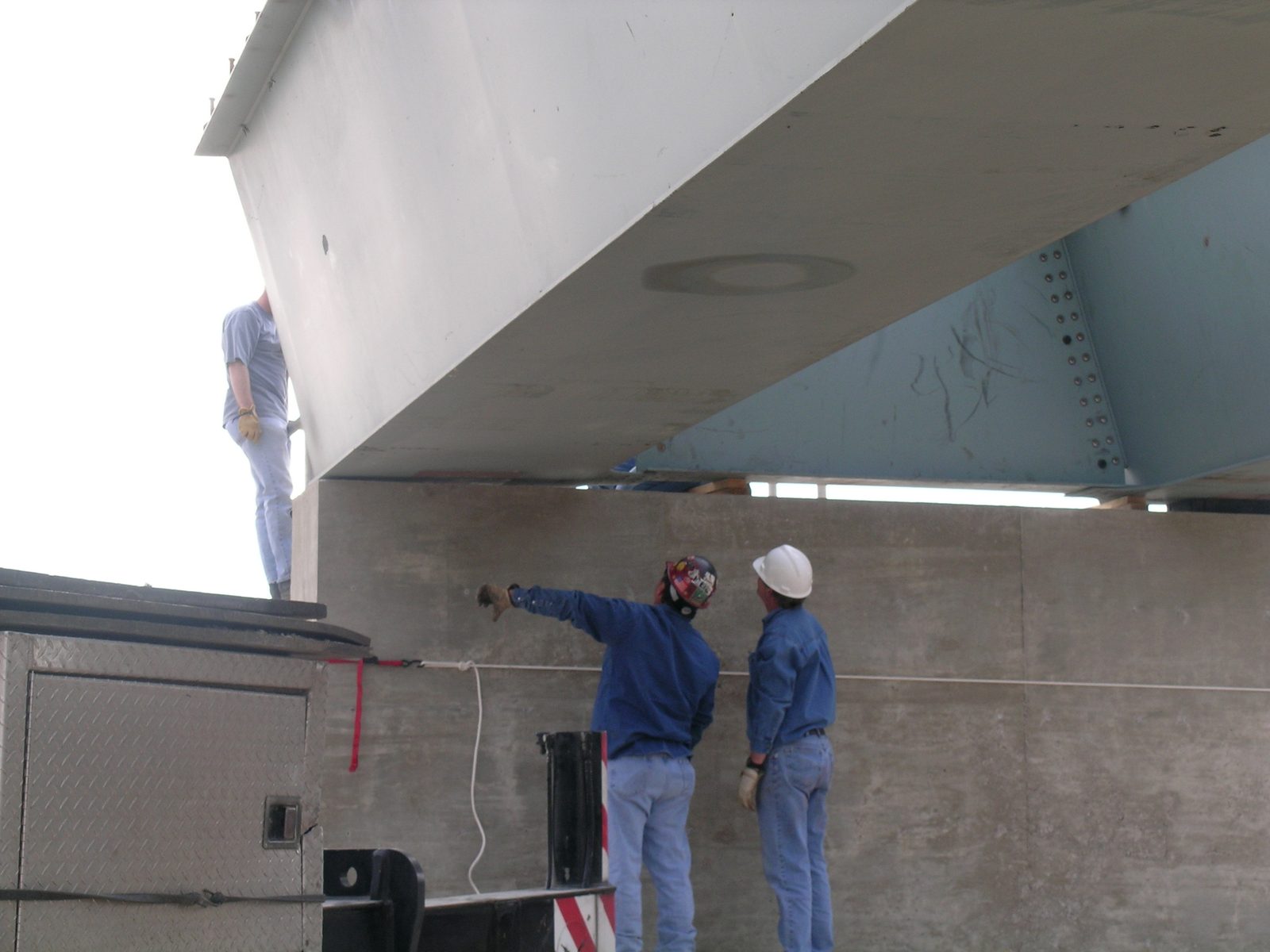 Fitting the bottom flange under the diaphragm oh-so-carefully.