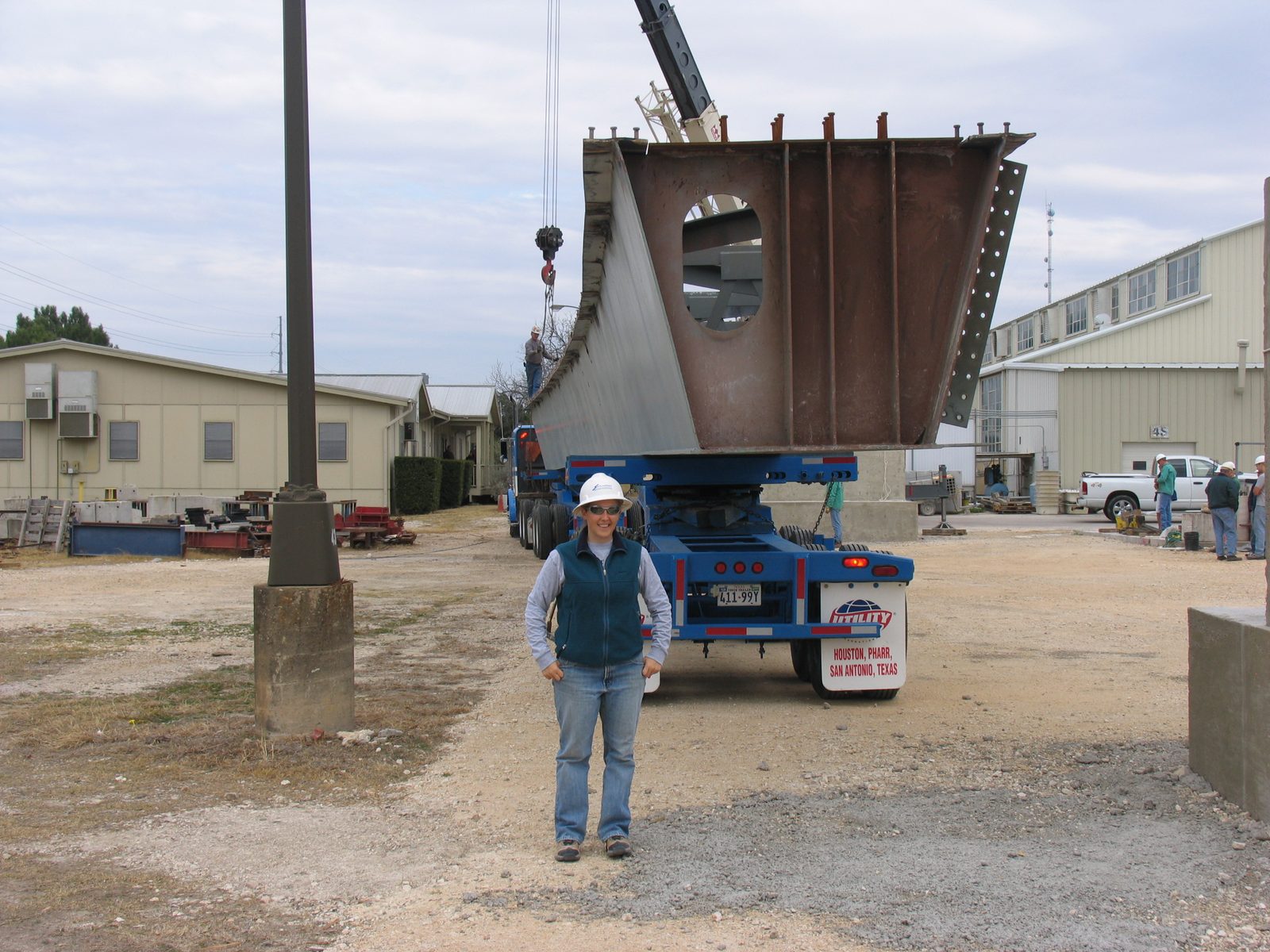 Catherine makes friends with a girder.  Height of C = 5'4".  Height of girder = 4'9".