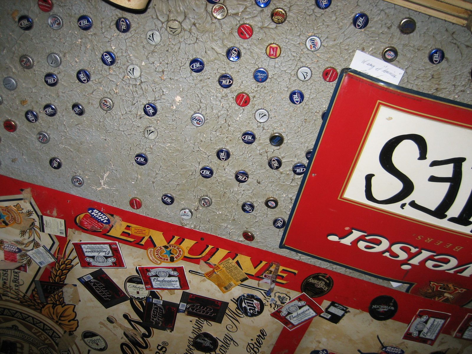 The ceiling was such that you could stick your bottle gap into it.  One of those was put there by me. 