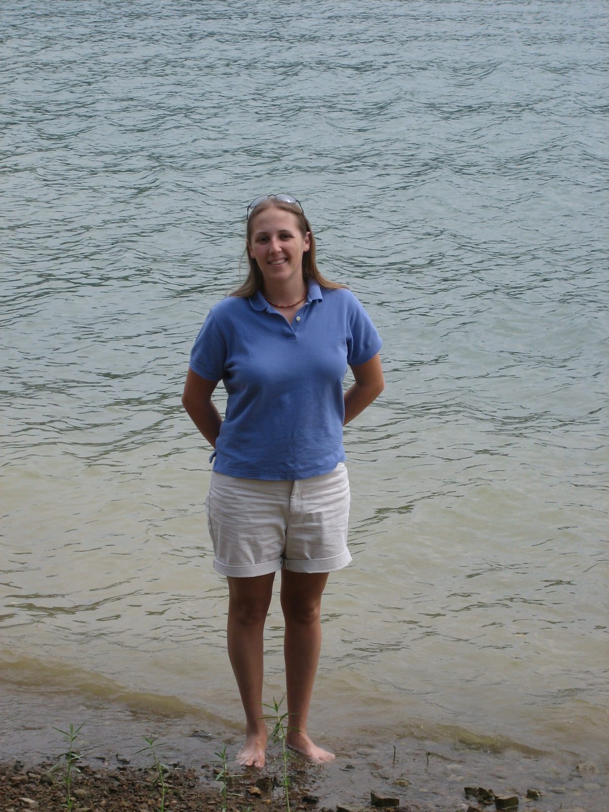 Catherine standing on the shore.