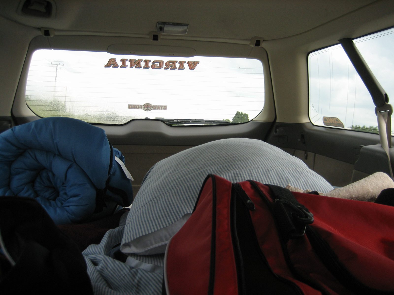 On the road to San Saba for the Fletcher Family Reunion.  The back of the Subaru seemed like a...