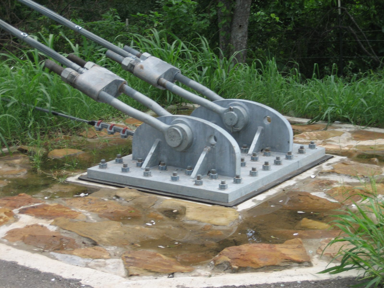 The bridge was a very simple suspension bridge; here were the "anchor blocks".