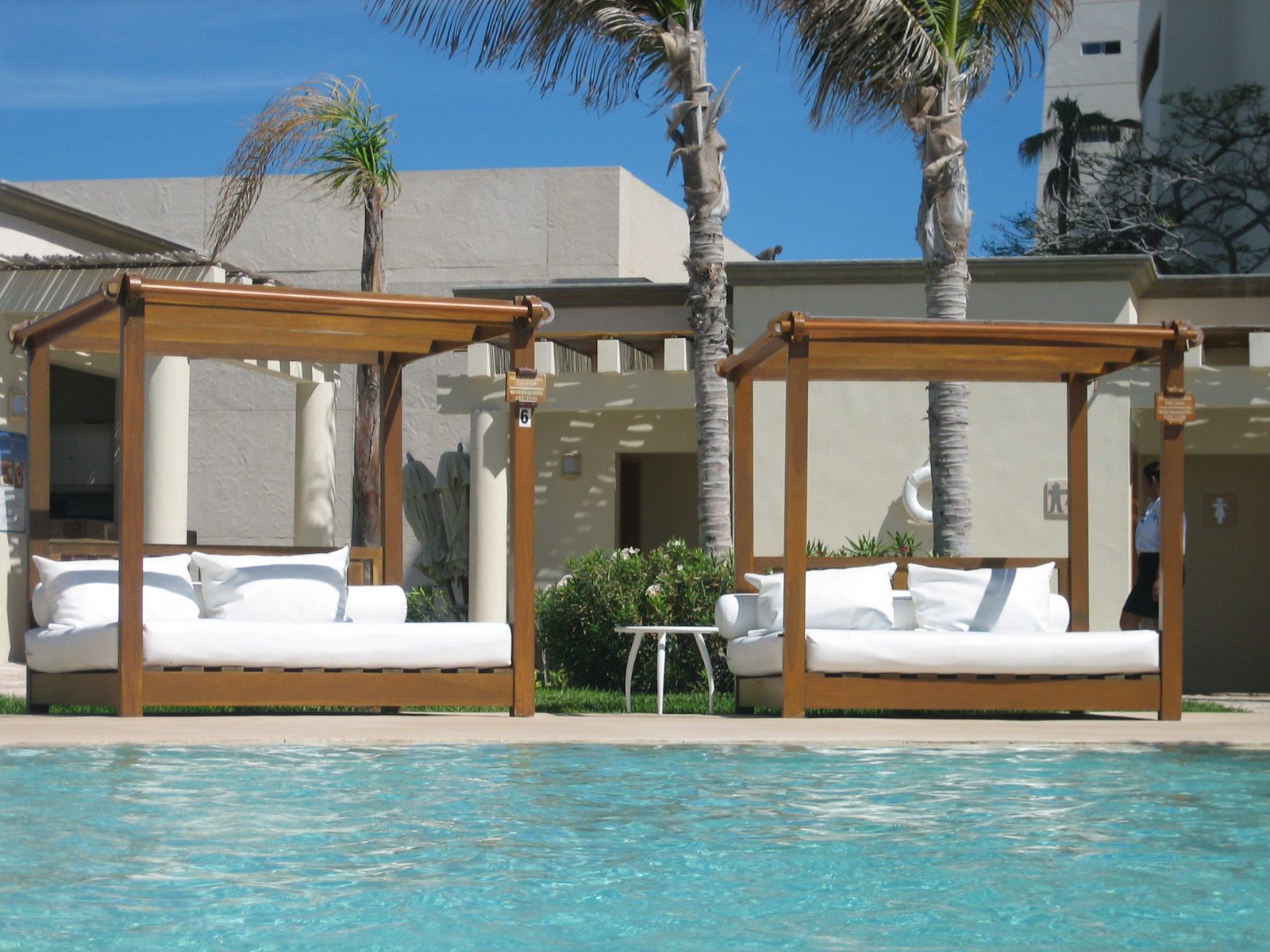 Two of the pool-side beds you could reserve (for $30/day).  If reserved, the staff would hang...
