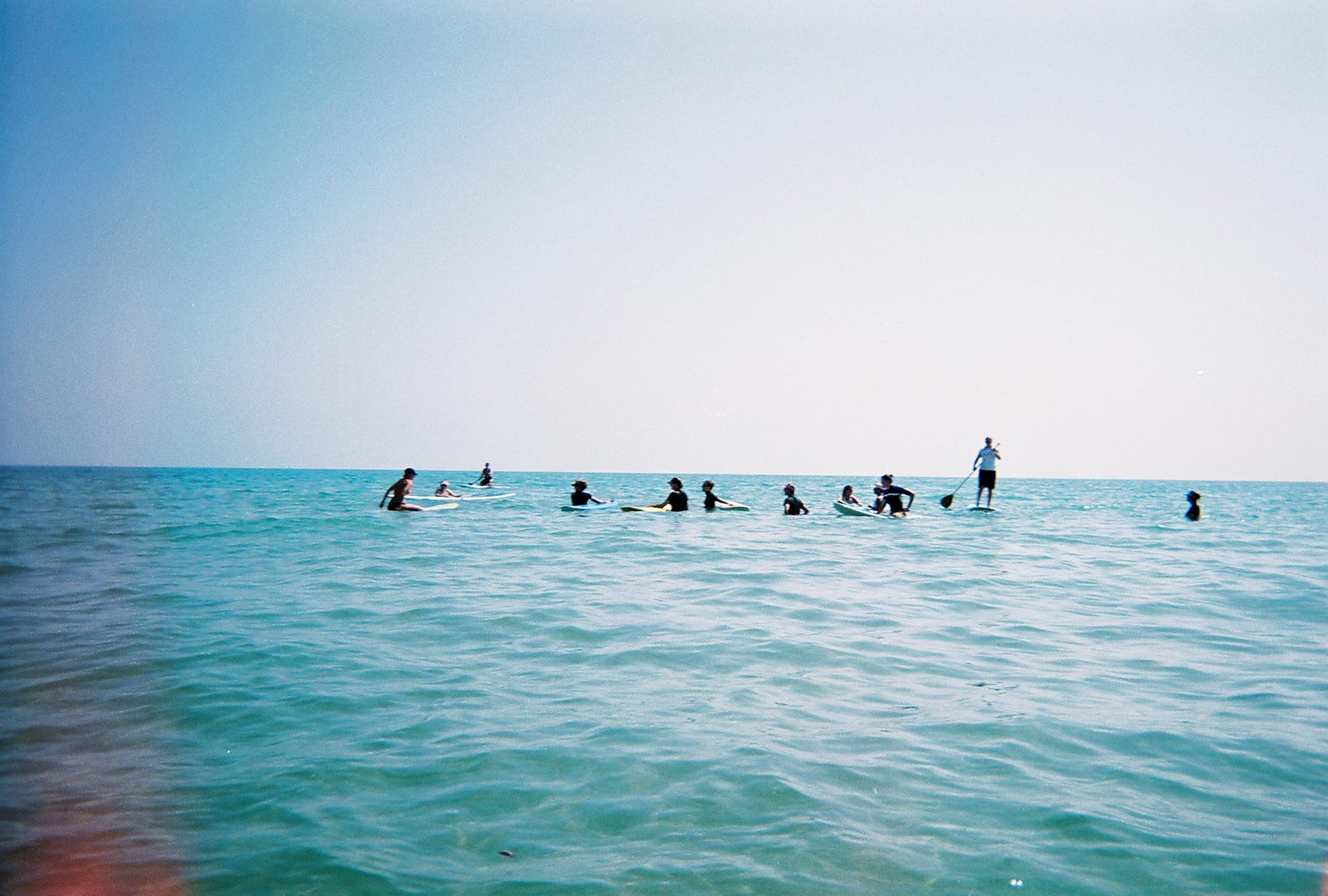 Stand-and-paddle!  The group mills while Cat (I think) SAPs.