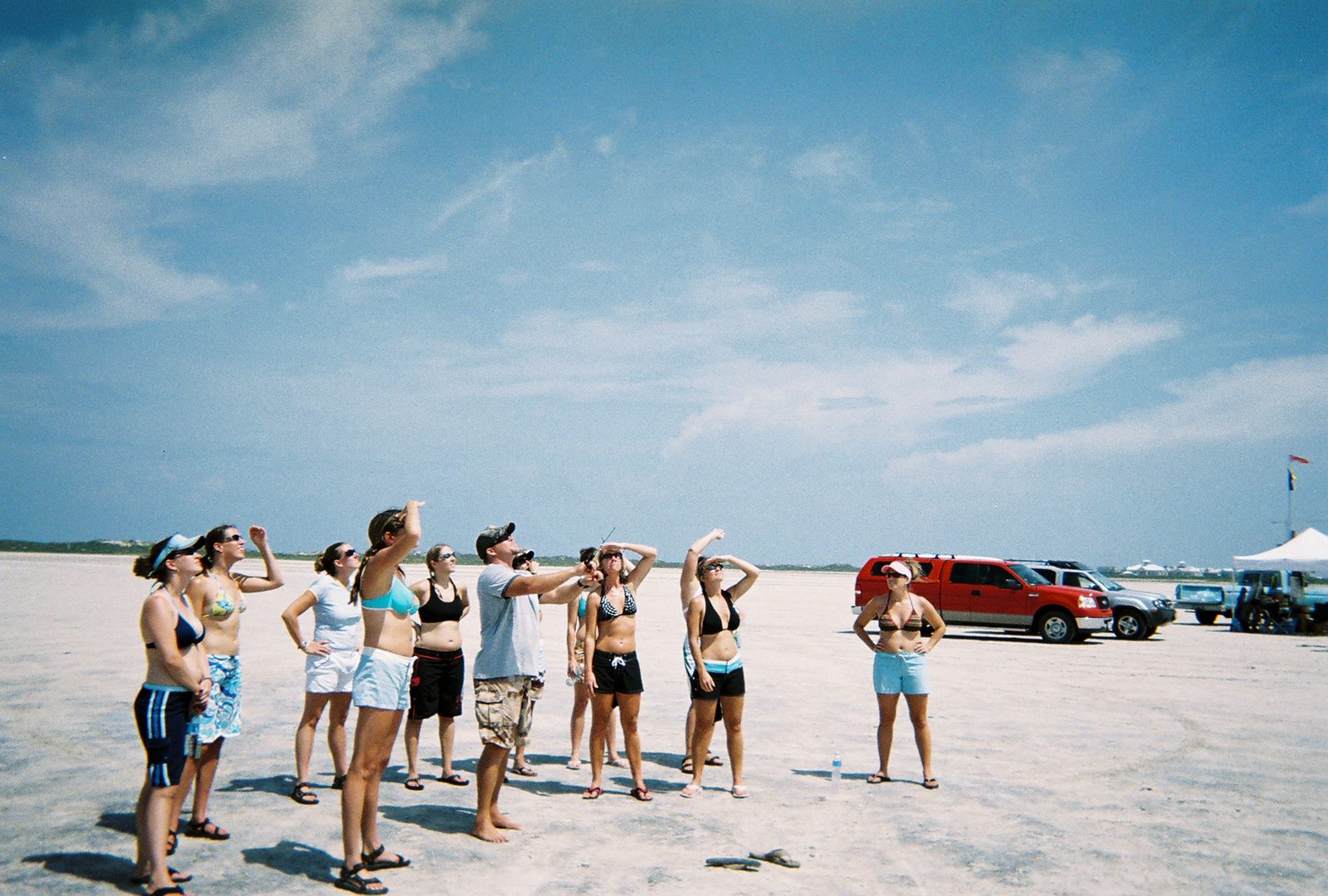 An introduction to kiteboarding!  The group watches Cliff fly the trainer kite.