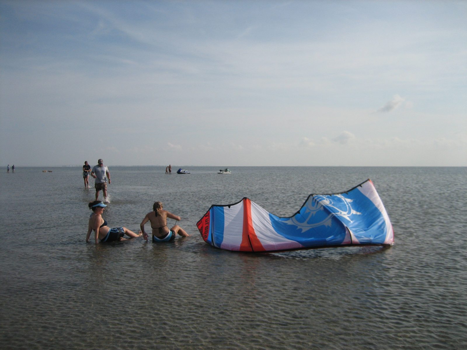 Friday evening in the oh-so-deep water (6-12"), learning how to fly the big kites.