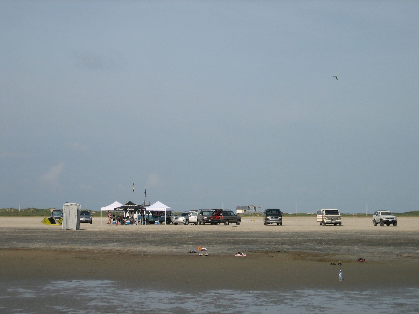 Our private little section of beach (and by "little", I mean huge) with cars, tents, and...