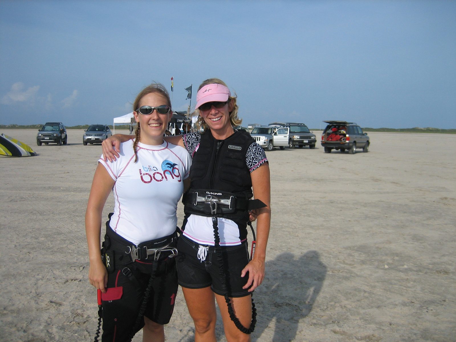 Cat and Jules, post-first flying experience.  Also, a demonstration of two of the harness types...