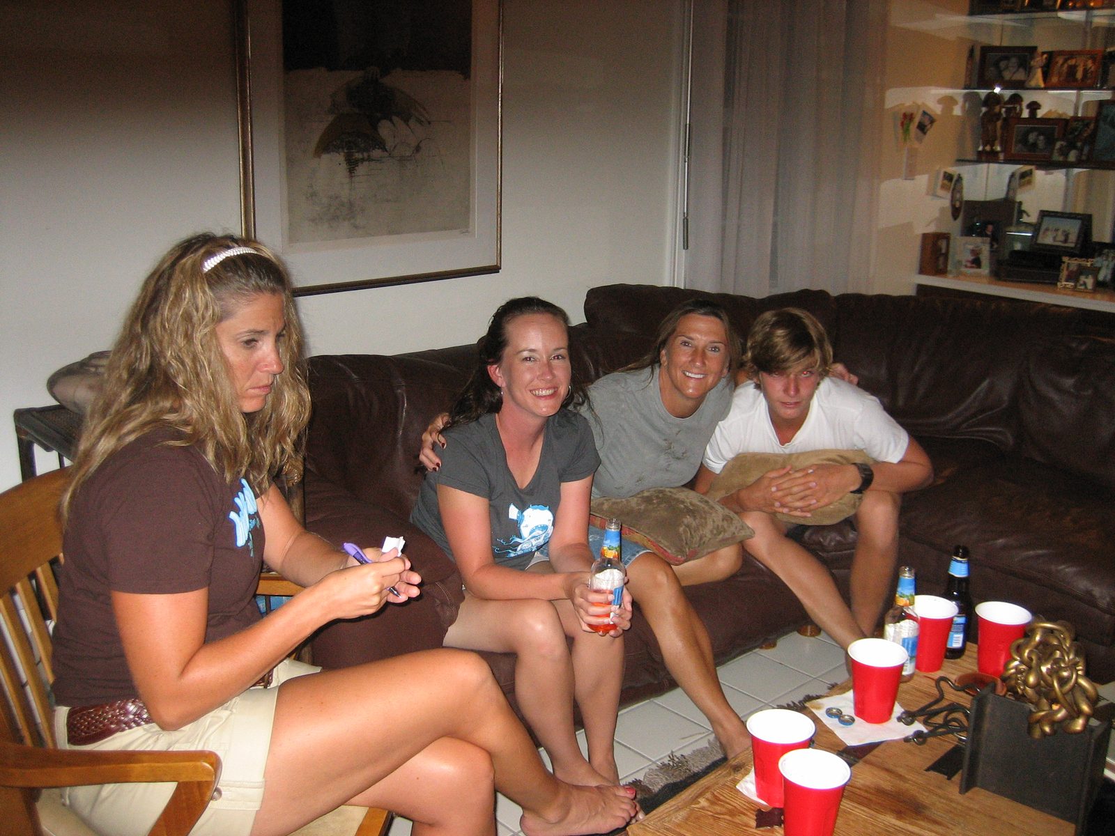 Justyne has no idea I'm taking this picture of LeAnn, Amy, and Eddie.