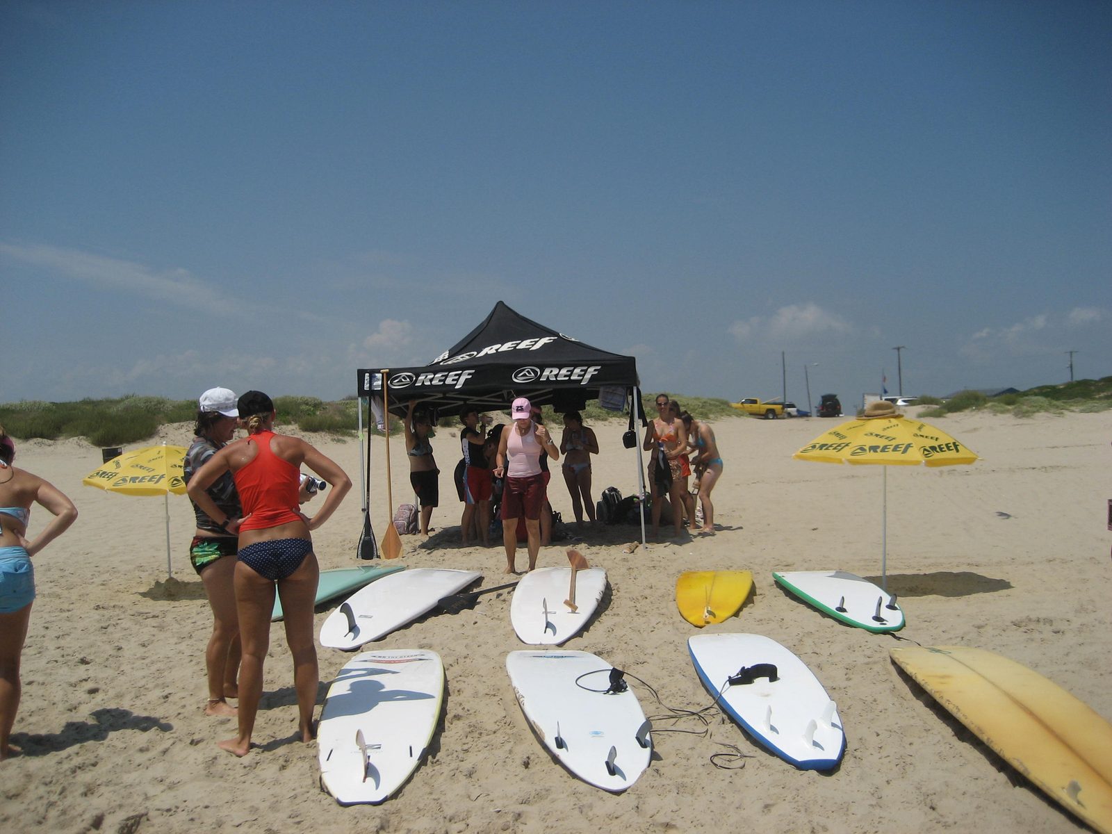 The Reef tent, Reef umbrellas, and Reef-sponsored girl (Molly).