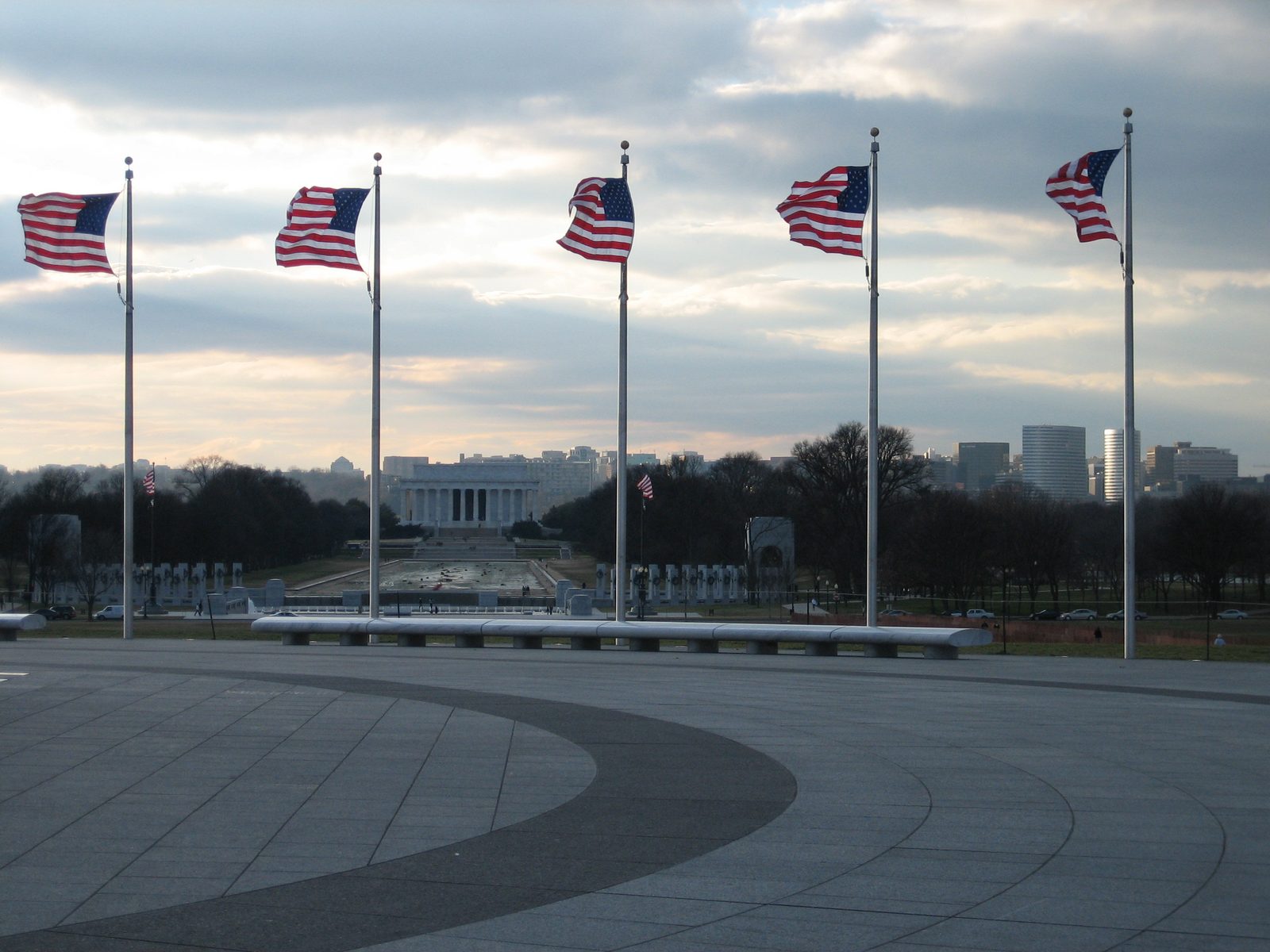 Flags blowing in the (very cold) wind and the Lincoln Memorial in the distance.  Also, an empty...
