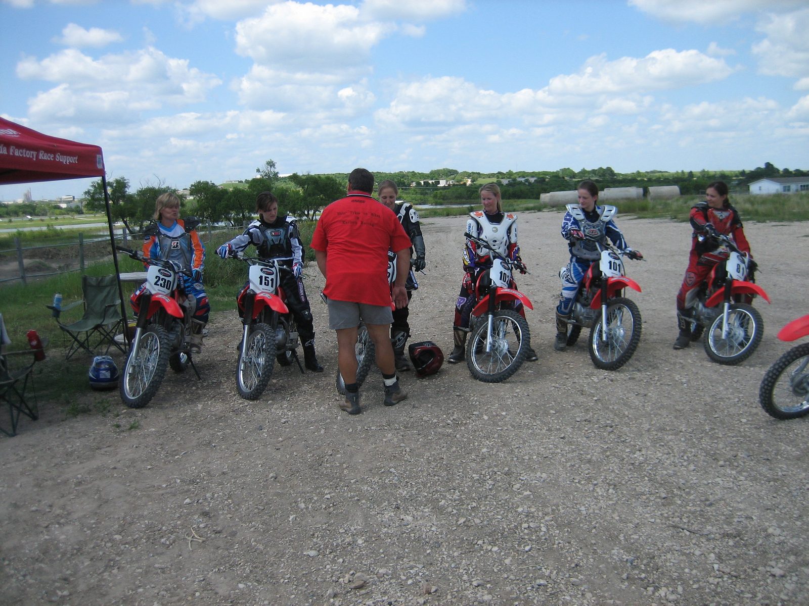 Dee, Carrie, Cat, Leslie, Missy, and Jeana line up and listen to Hans' instructions.
