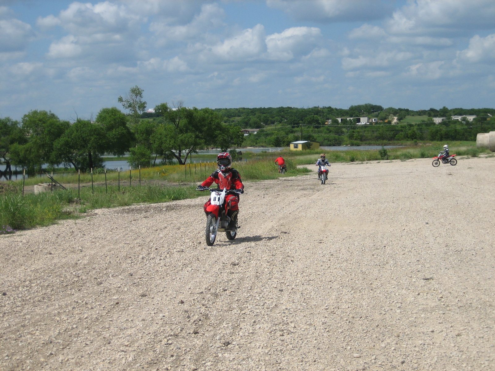 The group cruises around the warm-up area, getting a feel for the bikes.