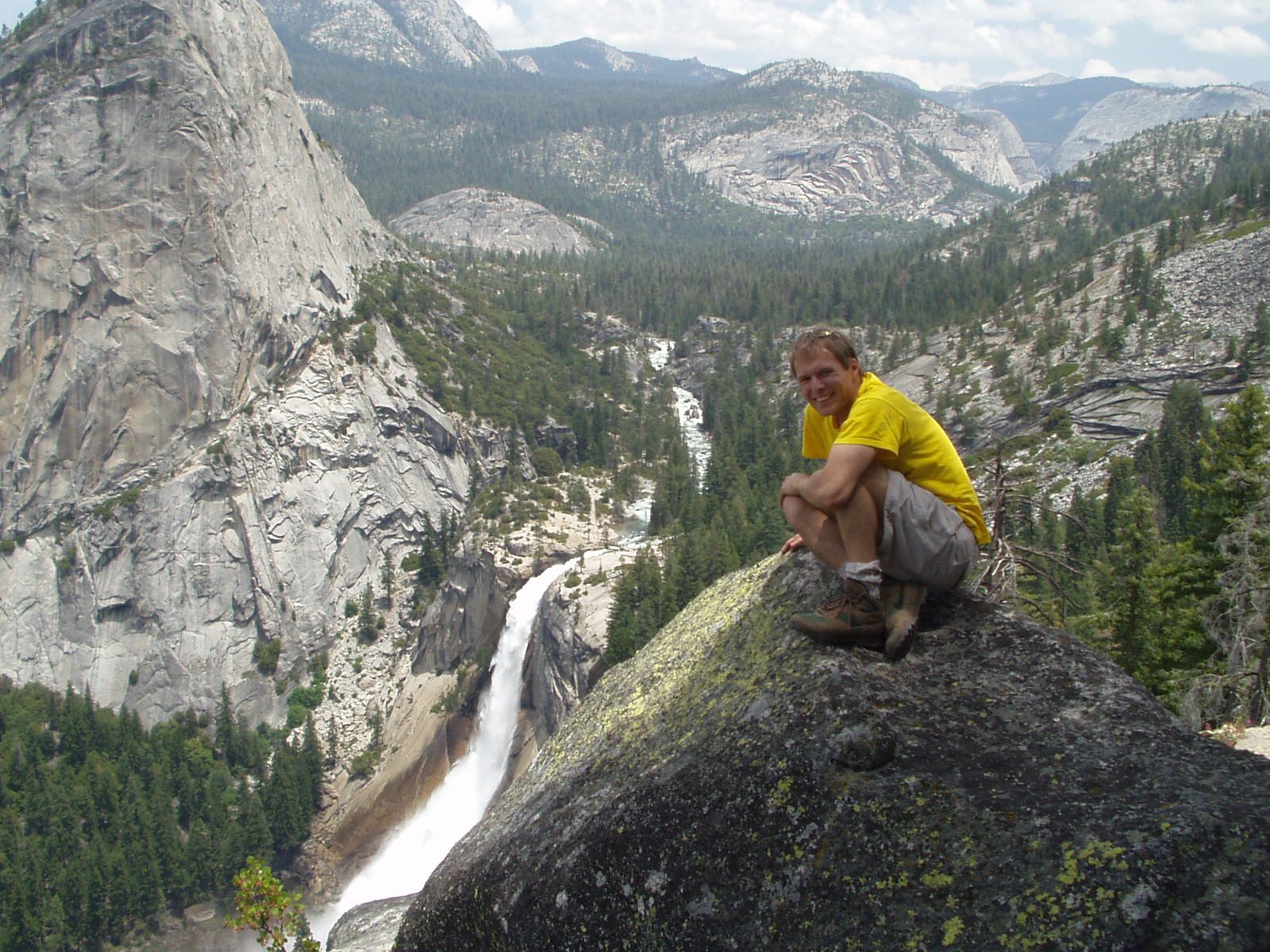 John perched on a rock to get a better view of Nevada Falls and Sentinel Dome (center and left...