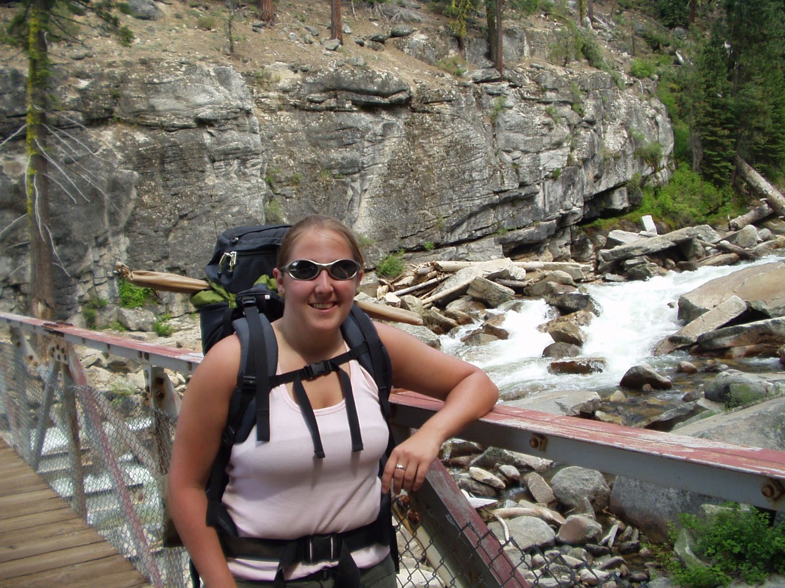 Catherine on the bridge possibly over Illilouette River.