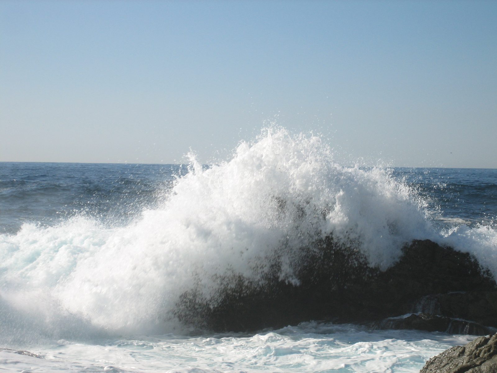 Waves breaking on the rocks at a tidepool south of Carmel.