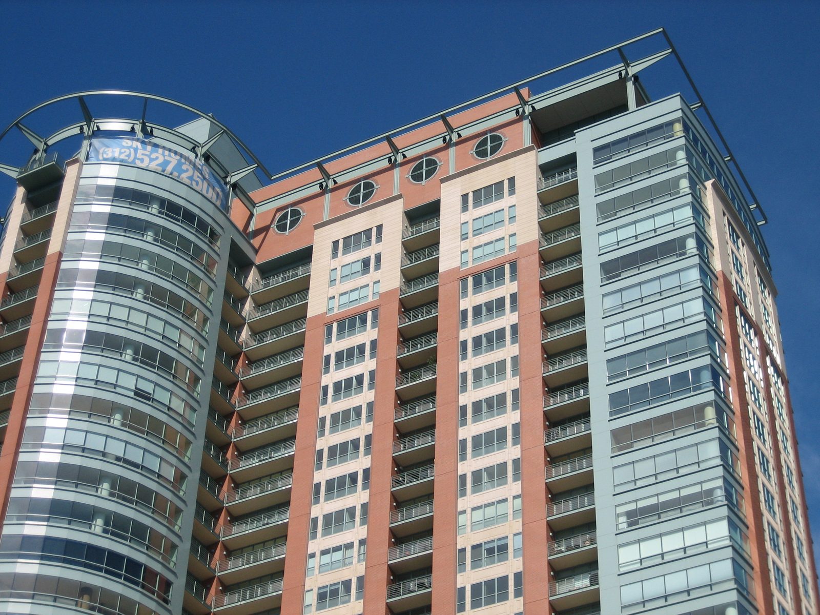A nice-looking new apartment complex just north of the river.